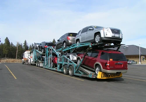Chiloquin Towing: Loaded car hauler in need of repair