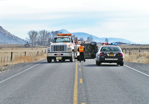 Chiloquin Towing: vehicle on its side blocking roadway